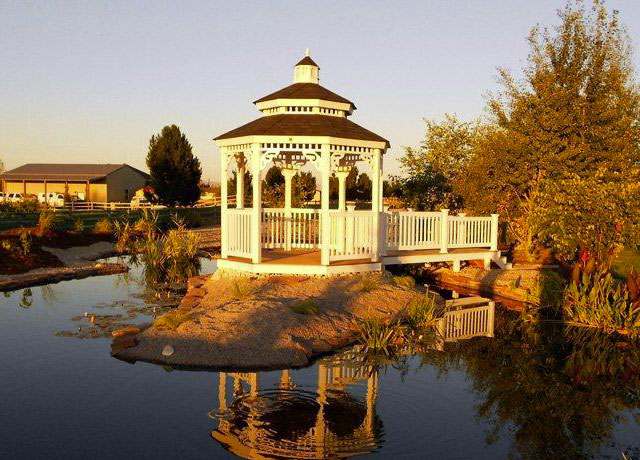 A gazebo by a pond